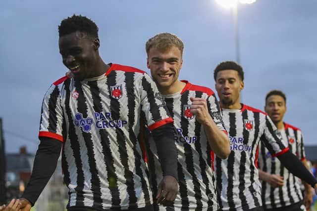 Tom Carr, right, congratulates Momodou Touray after scoring (photo: David Airey/dia_images)