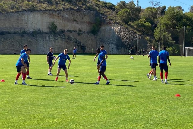 Passing drills ahead of kick-off in Spain