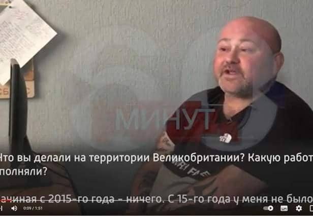 Leyland aid volunteer Paul Urey appearing in handcuffs on Russian TV.
