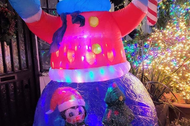 Joan Hill from Leyland had inflatable snowmen as part of her Christmas decorations to aid Derian House