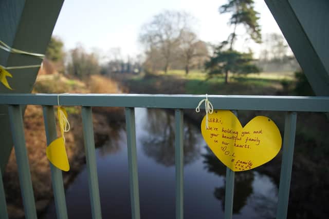 A yellow ribbon with a message of hope written on it tied to a bridge over the River Wyre in St Michael's on Wyre (Credit: Peter Byrne/PA Wire)