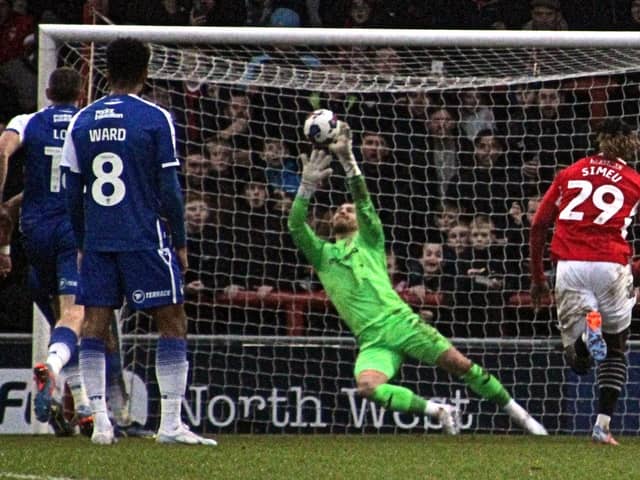 Morecambe keeper Connor Ripley keeps out Scott Sinclair's penalty last weekend Picture: Michael Williamson