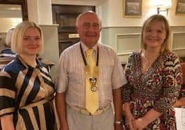 Olga Borysenko (left) and Zoe Barker-Moss with Kirkham Rotary president Richard Bell.