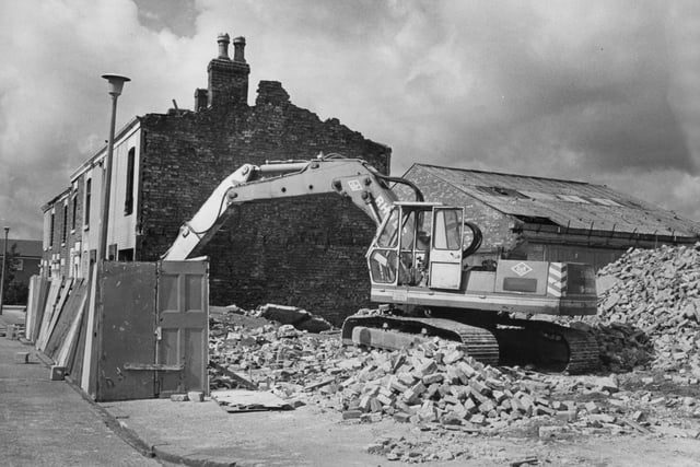 Demolition work on a row of condemned houses in Gillett Street, off Ribbleton Lane, Preston