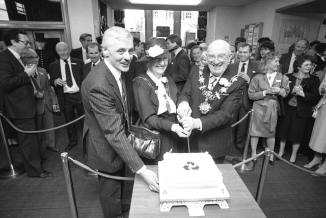 A Lancashire bank has taken a step back in time to celebrate its centenary. Staff at the National Westminster Bank in The Square, St Annes, have been wearing period Victorian costume to celebrate. Pictured: The Mayor of Fylde Coun Richard Spencer, cuts the centenary anniversary cake, watched by the Mayoress and the senior manager of St Annes branch of the National Westminster Bank, Mr David Latham
