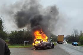 A grey Land Rover burst into flames on Lodge Lane, Leyland. (Photo by Phil Gardner)