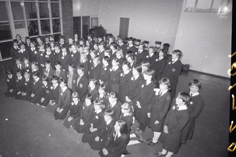 These youngsters from Fulwood High School have their sights set on fame. For the 103 choir members have made their own music record. The disc, recorded at the Pennine Studios, Oldham, tells the story of the life of a swallow