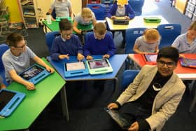 12-year-old Jay Mehta teaching coding to a class at the Royal Cross Primary school for Deaf Children
