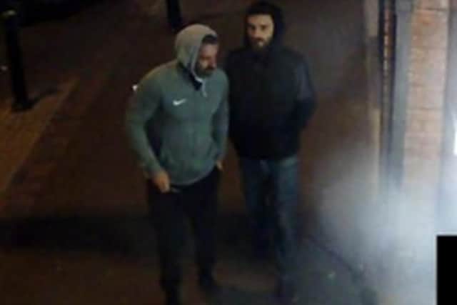 Police want to speak to these two men after thieves stole a bank card before withdrawing £200 from an ATM in Chorley (Credit: Lancashire Police)