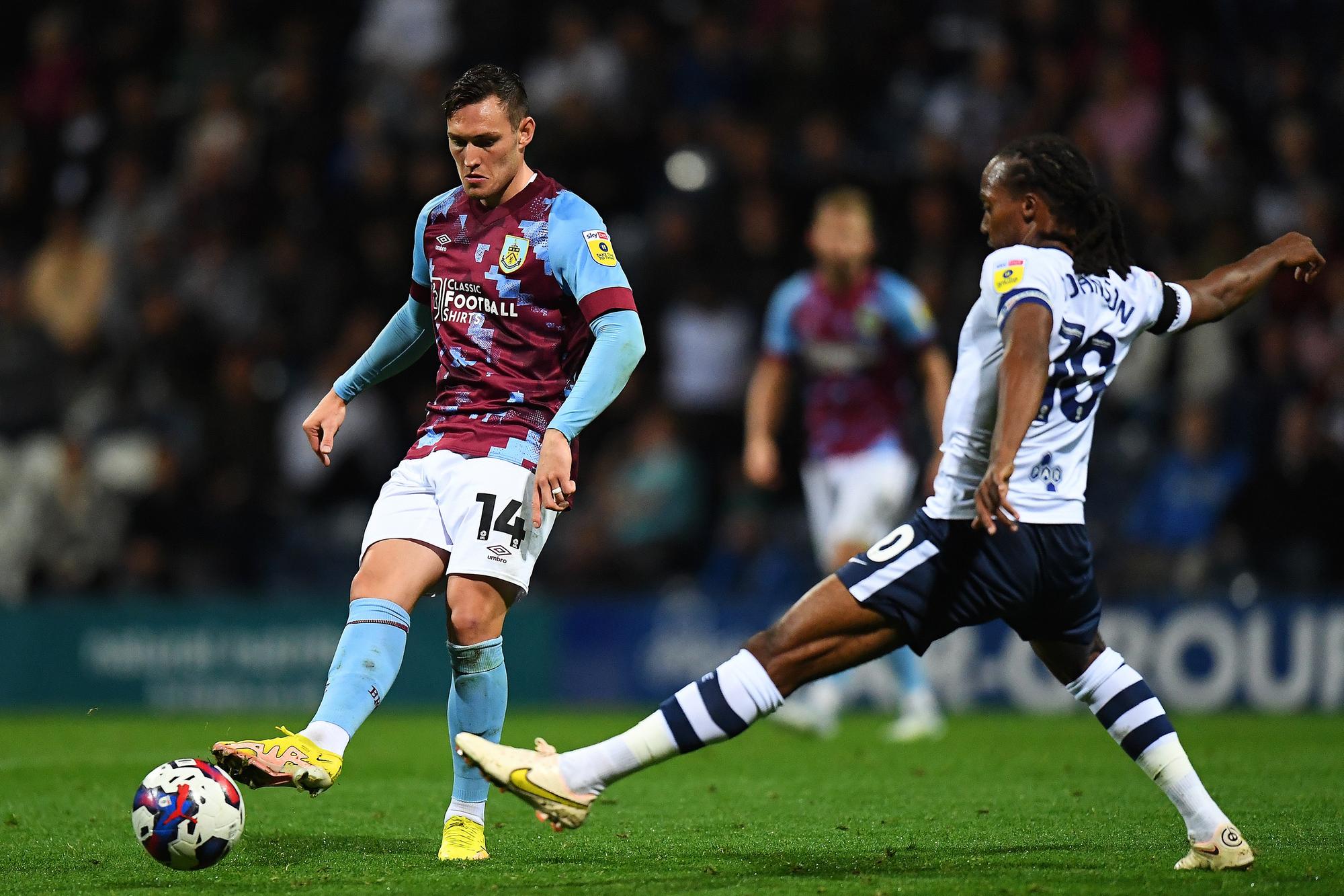 Burnley's Connor Roberts competes with Preston North End's Daniel Johnson 

The EFL Sky Bet Championship - Preston North End v Burnley - Tuesday 13th September 2022 - Deepdale - Preston