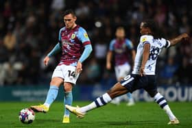 Burnley's Connor Roberts competes with Preston North End's Daniel Johnson 

The EFL Sky Bet Championship - Preston North End v Burnley - Tuesday 13th September 2022 - Deepdale - Preston