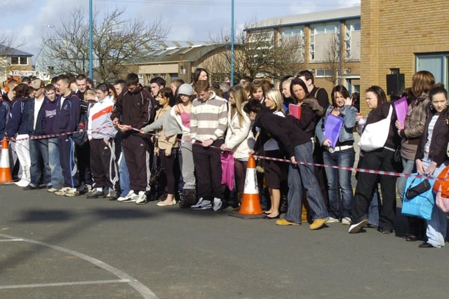 Students at Lancaster and Morecambe College gather to watch a road accident reconstruction