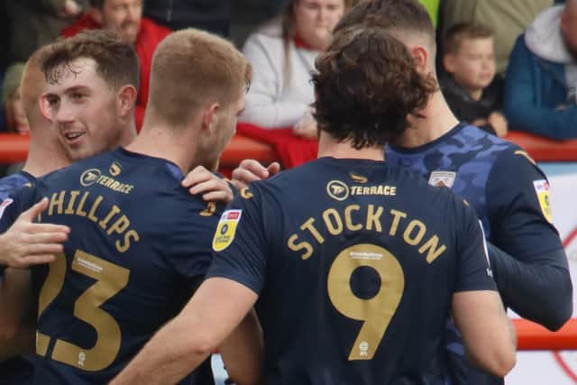 Morecambe celebrate Kieran Phillips' goal against Barnsley at the weekend Picture: Ian Lyon