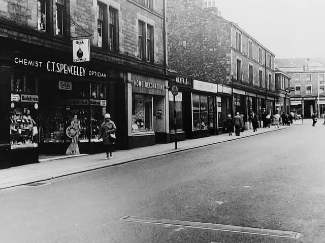 A view of Common Garden Street showing 1950s shops that are long gone.