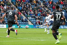 Preston North End's Tom Cannon scores the opening goal