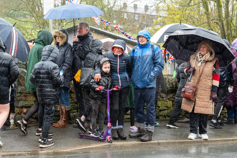 Crowds brave the rain awaiting the arrival of Princess Anne to Trawden. Photo: Kelvin Lister-Stuttard