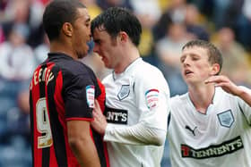 Keith Treacy gets up close to Watford's Troy Deeney.