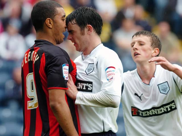 Keith Treacy gets up close to Watford's Troy Deeney.