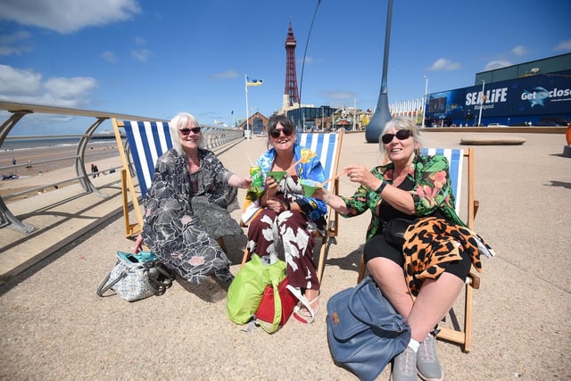 Julie Johnson, Joy Bray and Elaine Burgis catch some rays in their deckchairs