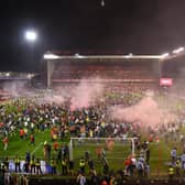 Nottingham Forest fans invade the City Ground pitch after their play-off semi final win over Sheffield United.