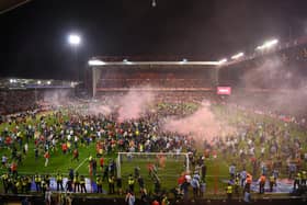 Nottingham Forest fans invade the City Ground pitch after their play-off semi final win over Sheffield United.
