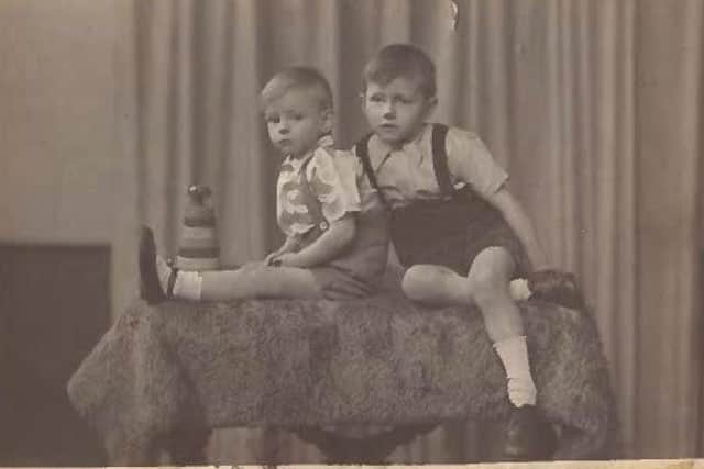 Bill Howard (left) with his brother Jack (right).