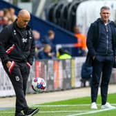 Stoke City manager Alex Neil controls the ball at Deepdale.