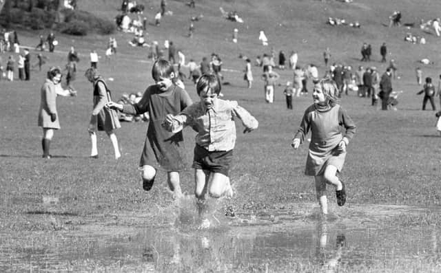 The gloomy forecasts of the weather men were happily proved wrong, as thousands of holidaymakers poured on to the sunny slopes of Avenham Park for the traditional Easter Monday egg-rolling festival. Though anybody who felt like cooling themselves could paddle in the large pools of rain water - the aftermath of a wet weekend