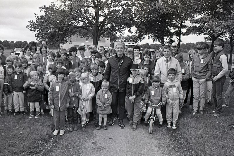 Charity organisers hope they may have reached their £2,000 target to raise funds for Christie's Children's Unit following a "mini marathon" by 50 children. The walk was started by champion foot-slogger Tom Benson on Moor Park in Preston