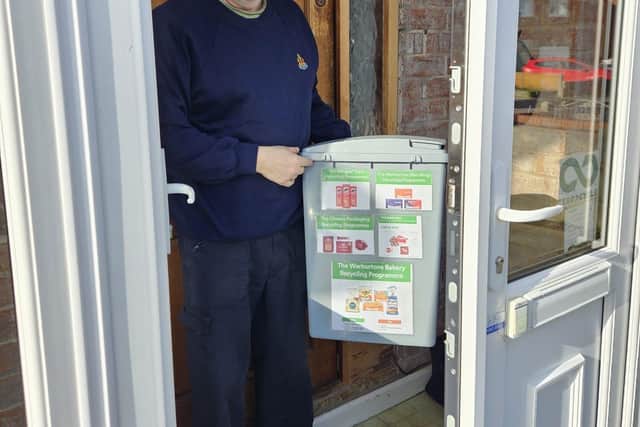 Ian Price standing at the drop-off location he set up.