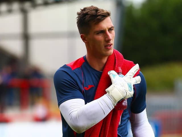 Morecambe keeper Stuart Moore has returned to training Picture: Jack Taylor