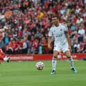 Ben Woodburn in pre-season action for Liverpool last season against Osasuna.