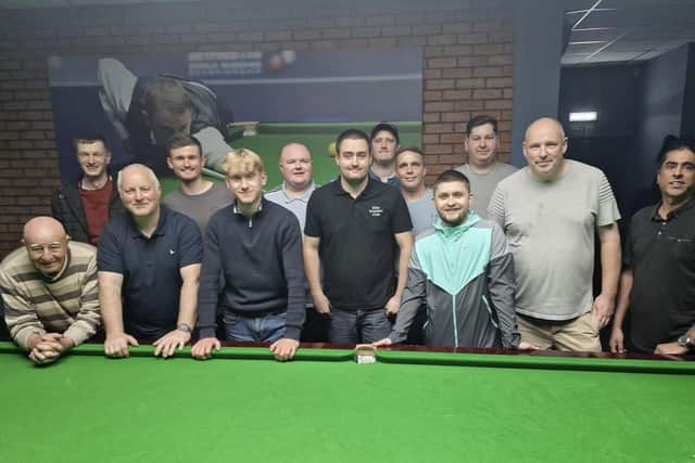 Division One winners Elite A (left), with Elite F's line-up on the right