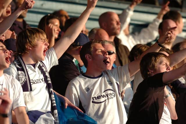 Preston North End fans in fine voice before the Leeds Utd v PNE Coca-Cola Championship play-off semi-final 1st leg match at Elland Road, Leeds in 2006