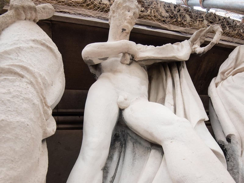 There are more than a dozen statues in The Harris' traingular pediment feature