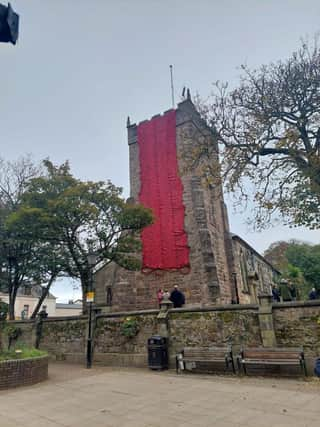 Remembrance display, curtain of poppies, St Chads church, Poulton Le Fylde. Photo:  RHS Poulton in Bloom