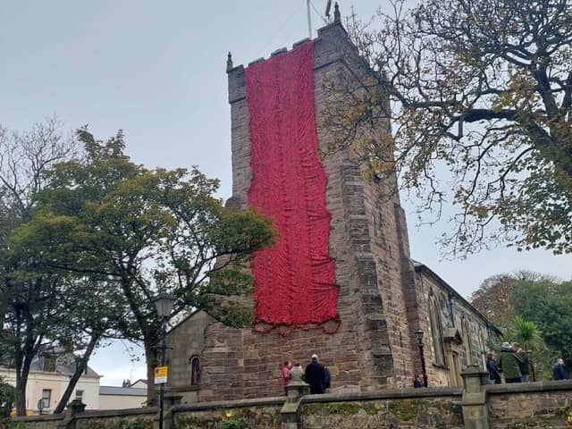Remembrance display, curtain of poppies, St Chads church, Poulton Le Fylde. Photo:  RHS Poulton in Bloom