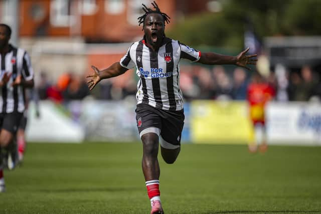 Justin Johnson celebrates scoring against Banbury United (photo: David Airey/dia_images)