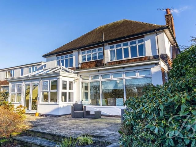 A view from the back of the £550,000 property makes for a spectacular sight. You can just spot the nice patio area in front of an array of windows that make the house so bright and airy.