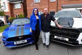 Adlington couple Bridget Alexander and John Nelson are offering free rides in sports cars to teens to help families who cannot afford the mounting costs of school proms. Photo: Kelvin Stuttard