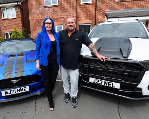Adlington couple Bridget Alexander and John Nelson are offering free rides in sports cars to teens to help families who cannot afford the mounting costs of school proms. Photo: Kelvin Stuttard