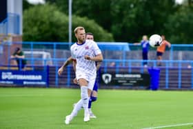 Harry Davis lobs in an early goal for Fylde (photo: Steve Mclellan/AFC Fylde)