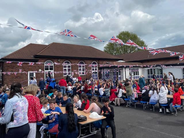 Children and staff celebrating the Coronation. 