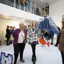 Turner Prize winner and UCLan Emeritus Professor Lubaina Himid CBE (centre) praised the exhibition. Here she is pictured with Monica Dean (left) from Corpus Christi Catholic High School, and Esmee Backhouse from All Hallows Catholic High School, with their denim designs.