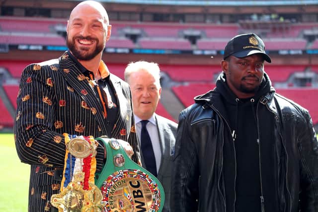 Morecambe's Tyson Fury (left), promoter Frank Warren, and Dillian Whyte  (right) during a press conference at Wembley Stadium