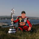 DOUGLAS, ISLE OF MAN - JUNE 07:  John McGuinness poses with the senior trophy during the Isle of Man TT (Tourist Trophy) Races on June 7, 2007 in Douglas, Isle of Man.  (Photo by Ian Walton/Getty Images)