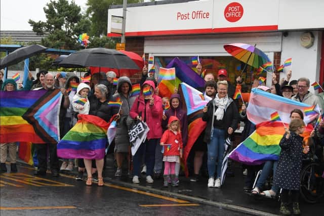 New Longton turns out in a colourful show of support.