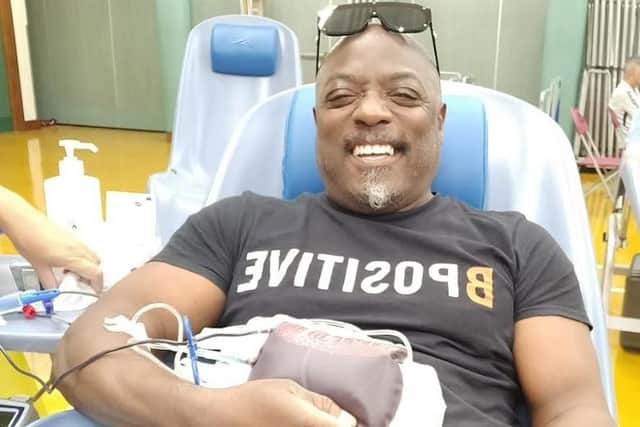 Ronald giving another 'armful' to encourage others to donate.