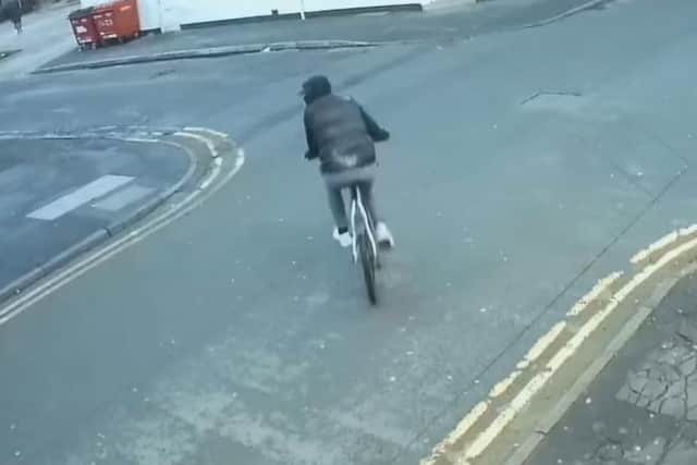 Police are asking for the public's help to identify this man after an elderly woman was robbed in Preston (Credit: Lancashire Police)