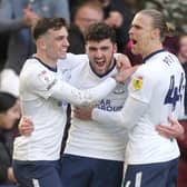 Preston North End's Tom Cannon celebrates scoring with Troy Parrott (left) and Brad Potts (right)